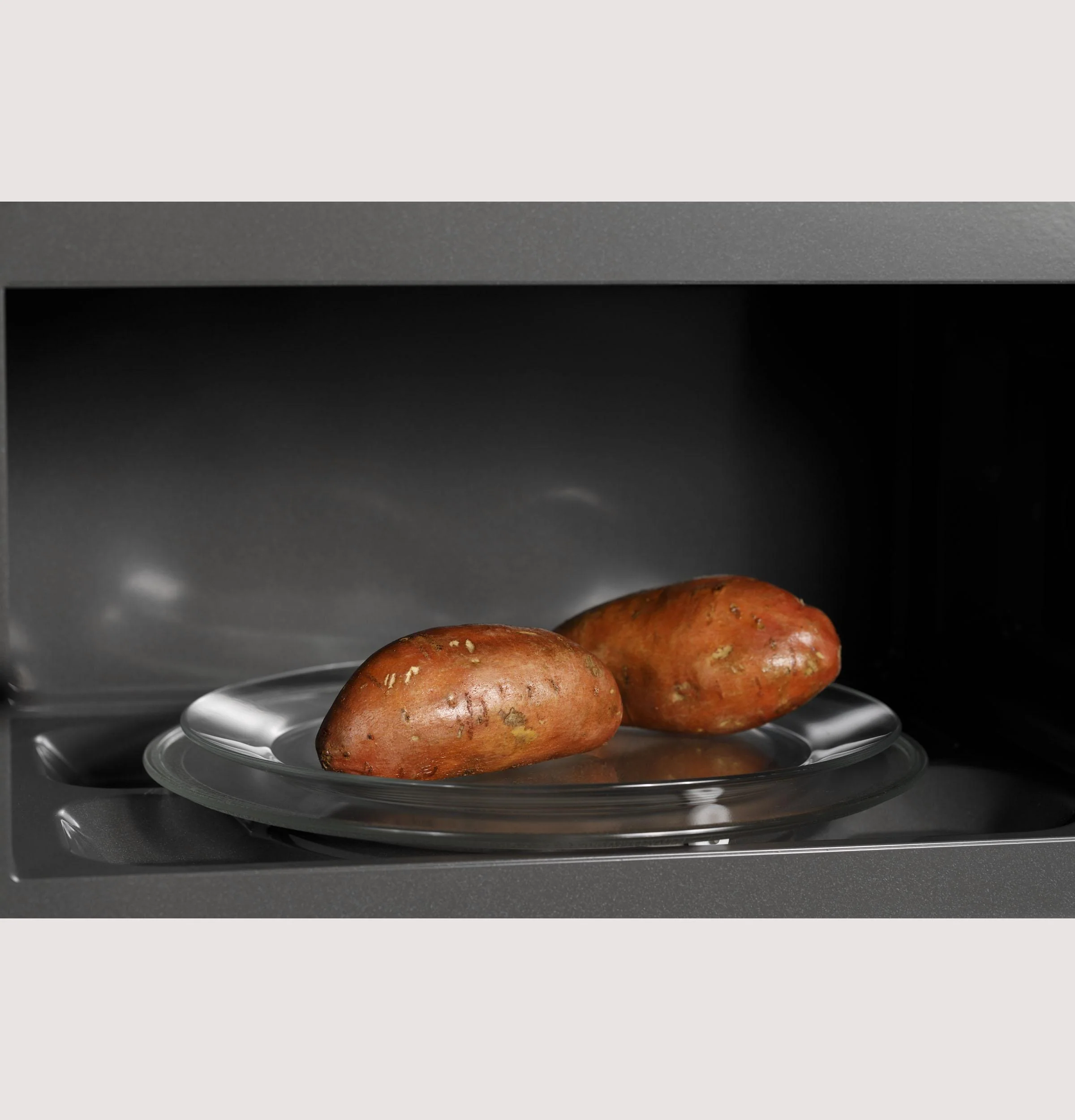 PVM9215SKSS GE Profile™ 2.1 Cu. Ft. Over-the-Range Sensor Microwave Oven - Image 11